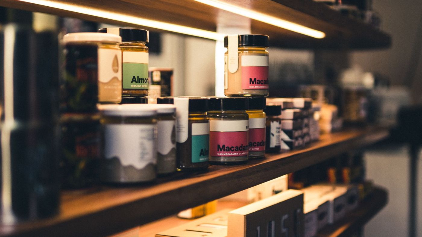 Specialty food products displayed on a retail shelf